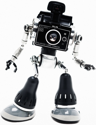 Illustration for article titled This Awesome Robot Art Was Built With Broken Toys and Old Electronics